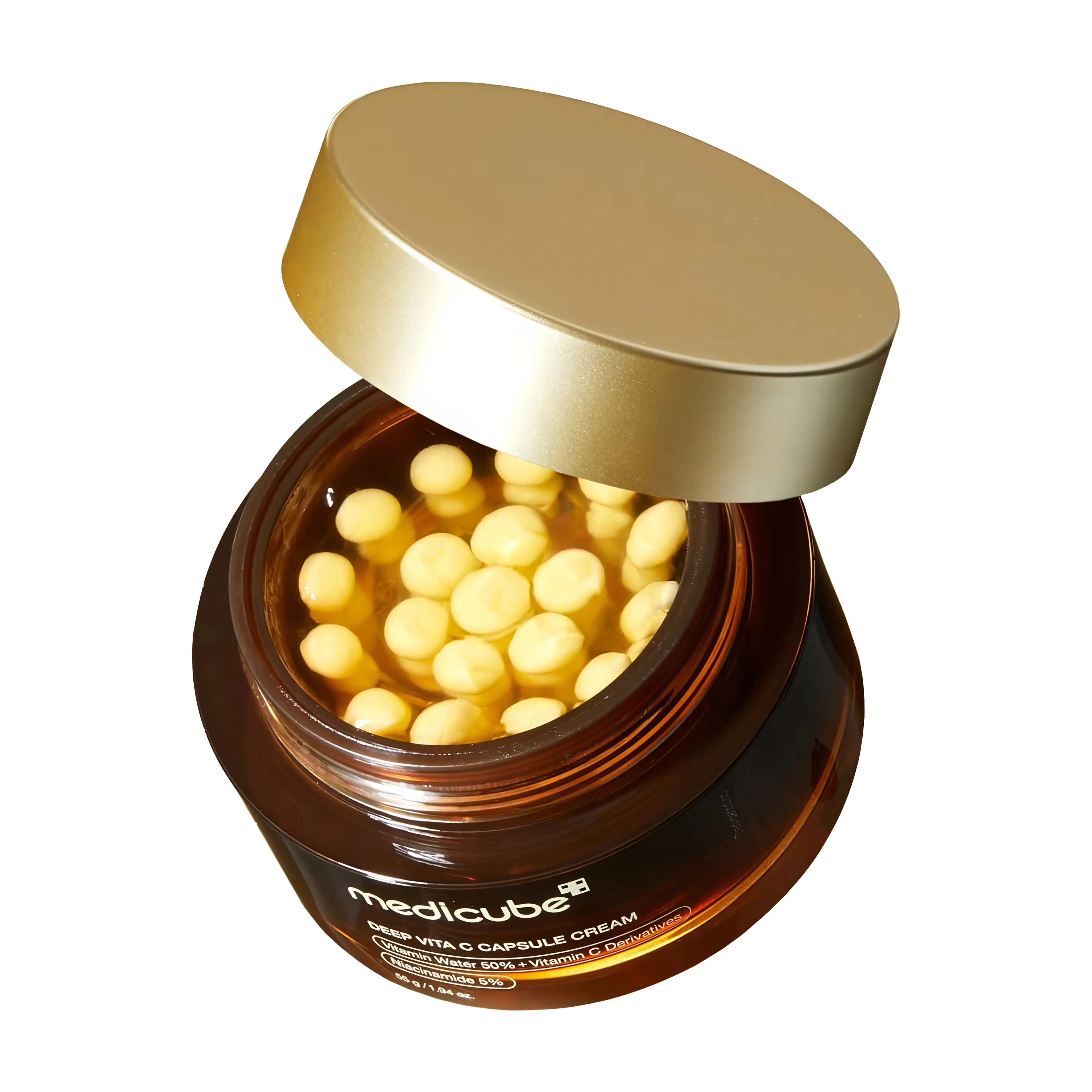 Medicube Deep Vita-C Capsule Cream (55g), customizable dual-phase brightening cream for dull, uneven tone, and hyperpigmented skin, features 50% sea buckthorn vitamin water, 5% niacinamide, pure ascorbic acid capsules, ferulic acid, vitamins E/Q/P to fade dark spots, even skin tone, boost collagen, provide antioxidant protection, and deep hydration with minimal irritation for all skin types.[web:369][web:370][web:374]
