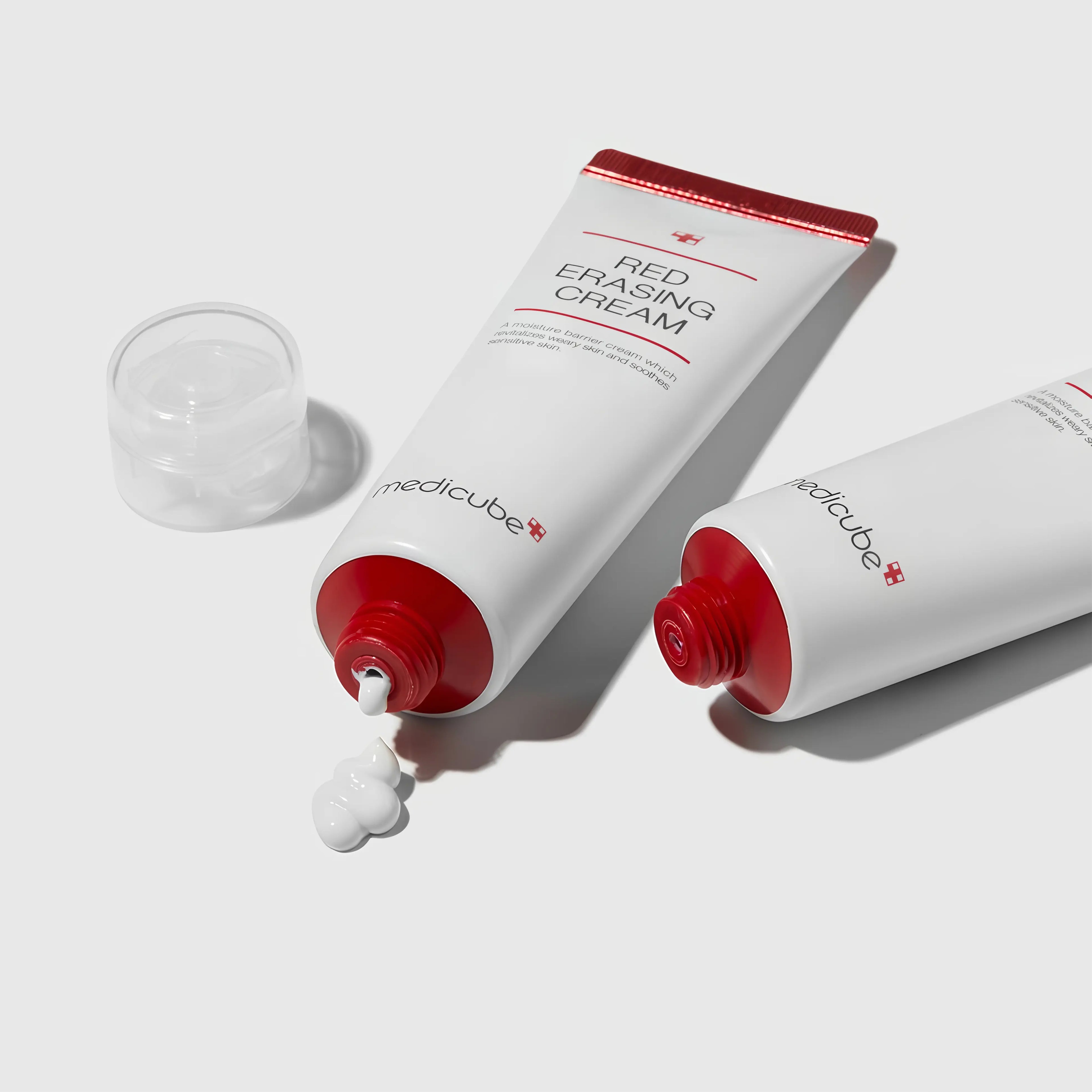 Medicube Red Erasing Cream 2.0, soothing barrier cream for sensitive, acne-prone, and redness-prone skin, enriched with niacinamide (70,000ppm), panthenol, centella asiatica, madecassoside, zinc oxide, and botanical extracts to calm inflammation, fade post-acne hyperpigmentation and dark spots, strengthen skin barrier, control sebum, and provide deep hydration for even-toned, resilient complexion.
