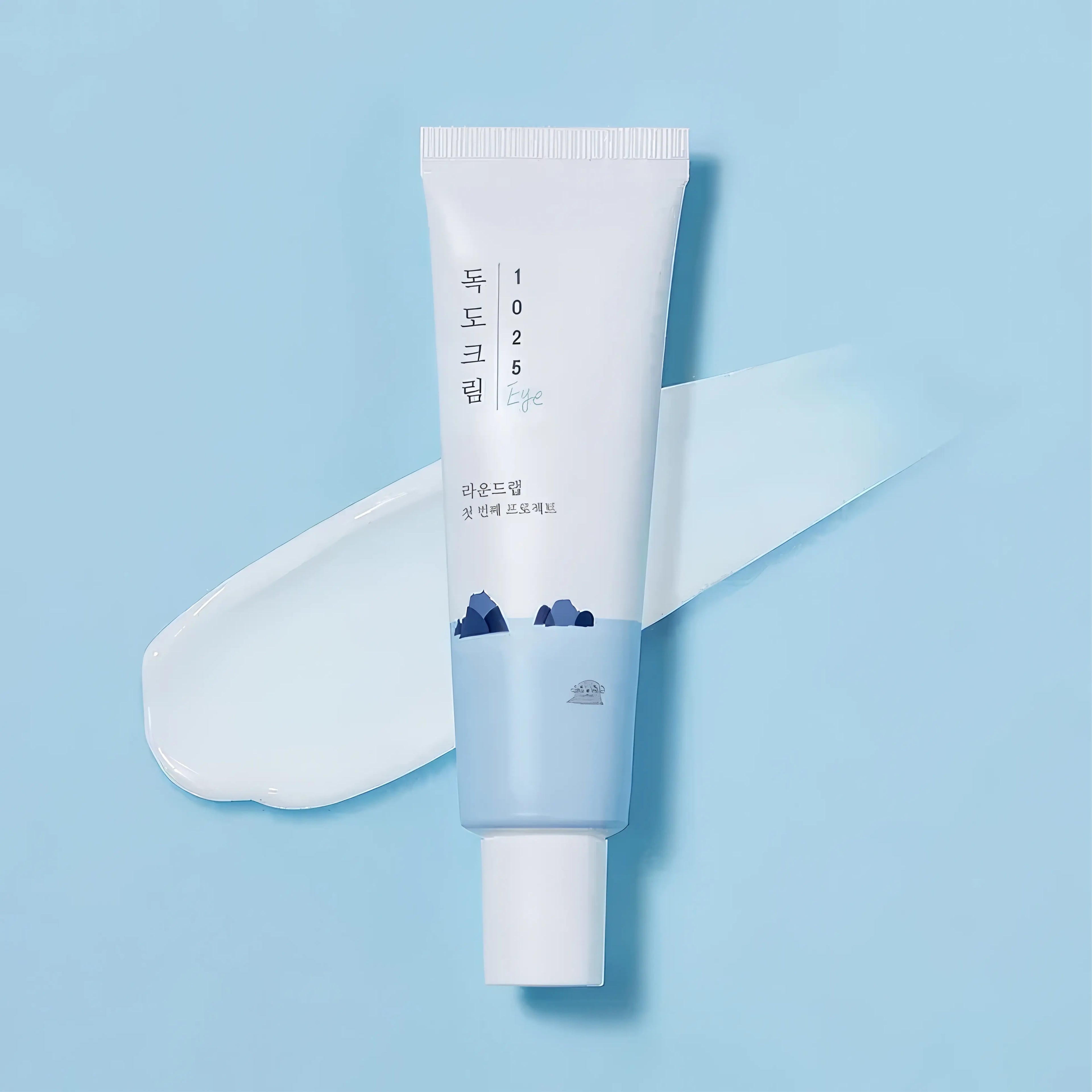 Round Lab 1025 Dokdo Eye Cream (30ml), nourishing eye cream for dark circles, fine lines, dry sensitive under-eyes with Ulleungdo deep sea water, 8 hyaluronic acids, niacinamide, peptides, panthenol, bisabolol, vitamin E, adenosine to hydrate deeply, brighten pigmentation, smooth wrinkles, soothe puffiness, and strengthen delicate barrier.
